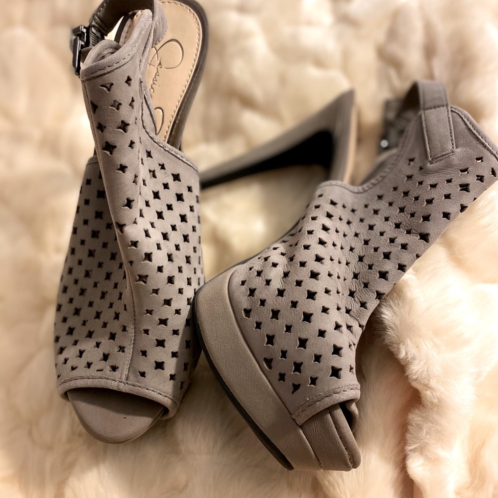 Never worn Jessica Simpson grey open toe & open back platform heels.